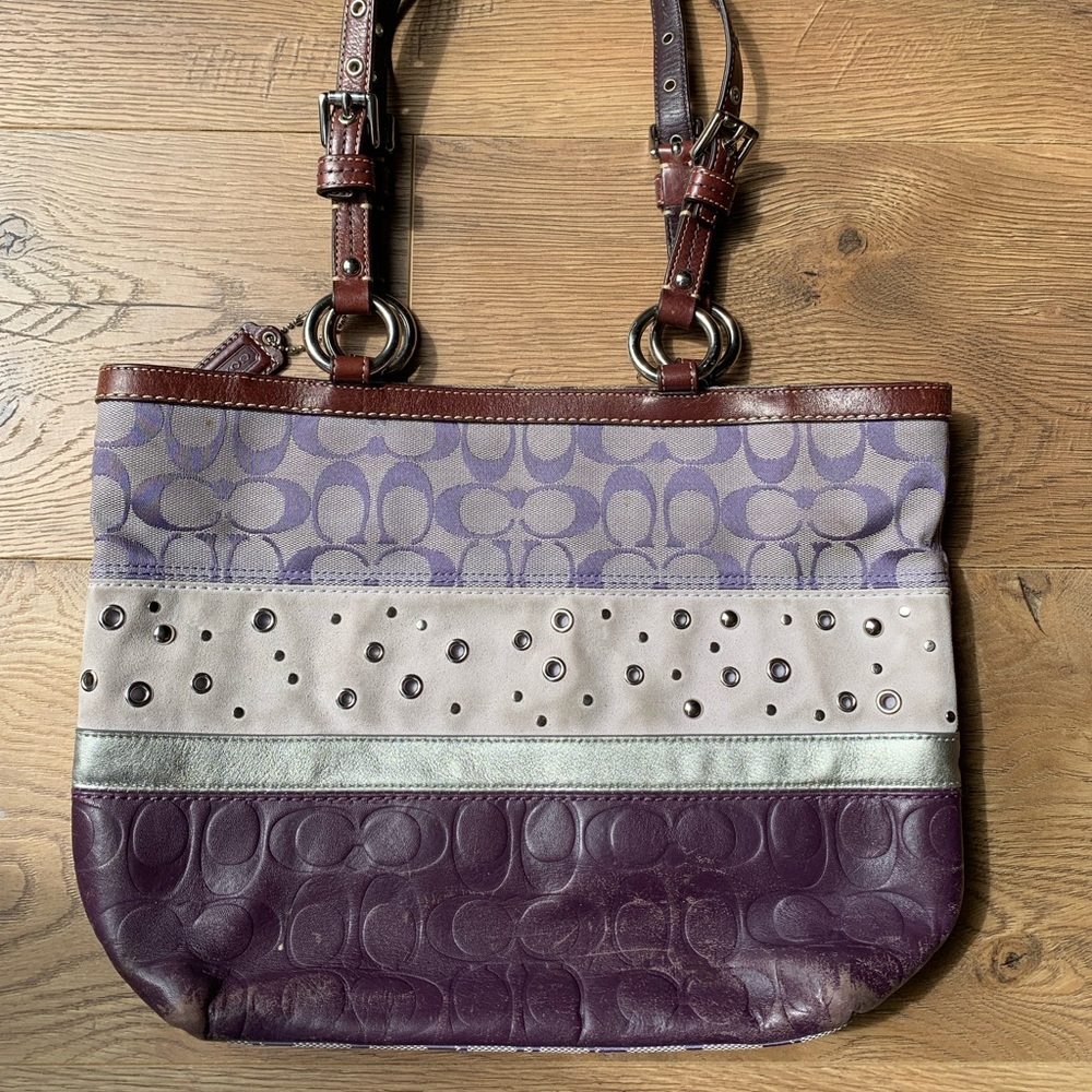 Purple coach purse. Non smoking home. Used